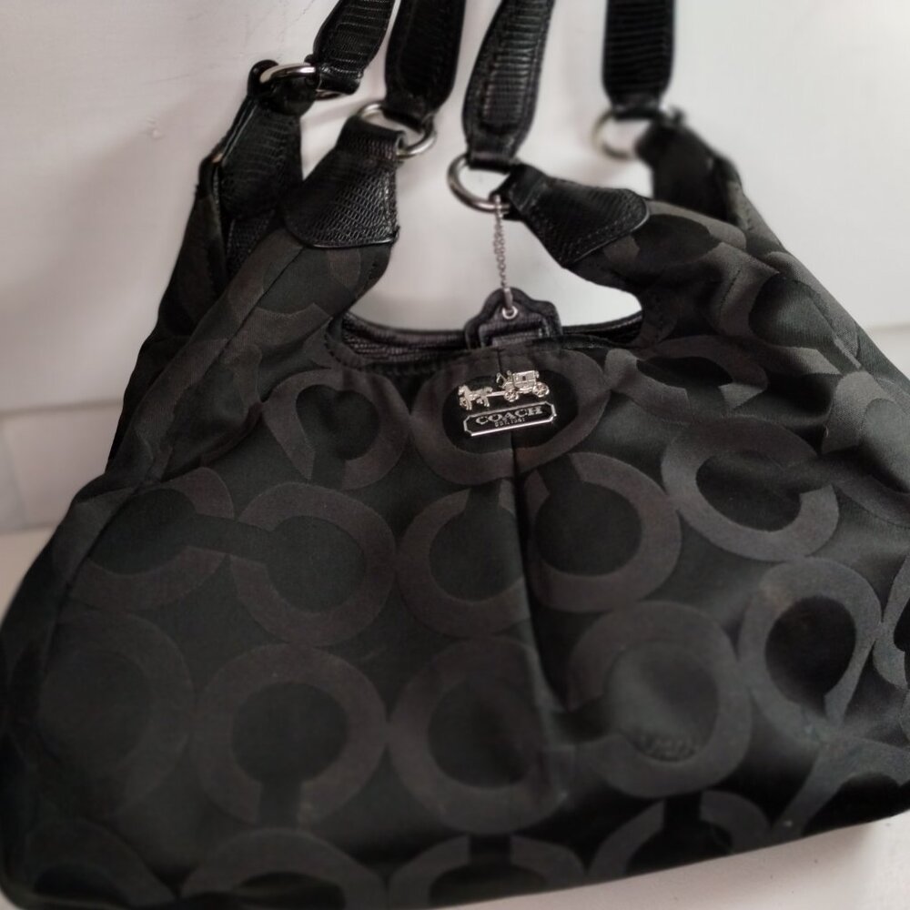 black Coach shoulder bag, Coach print